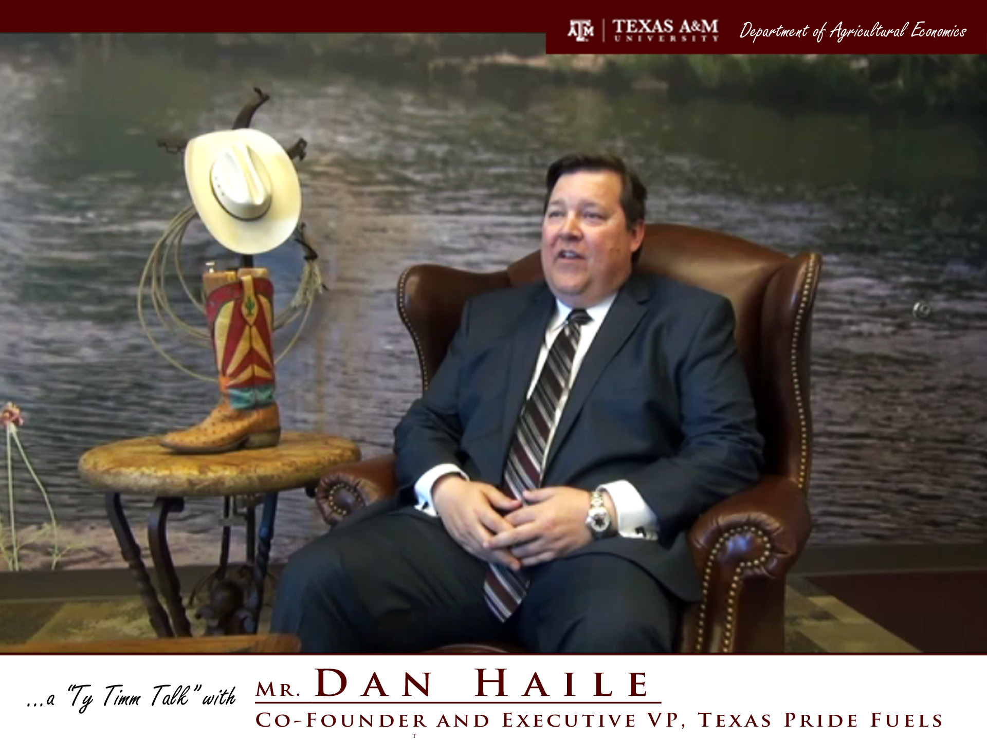 The words "a ty timm talk with Mr. Dan Haile - Co-Founder and executive VP, Texas Pride Fuels" run along the bottom. Mr. Catalena is seated in a dark brown leather chair and wearing a dark blue suit, smiling against a background of a lake.