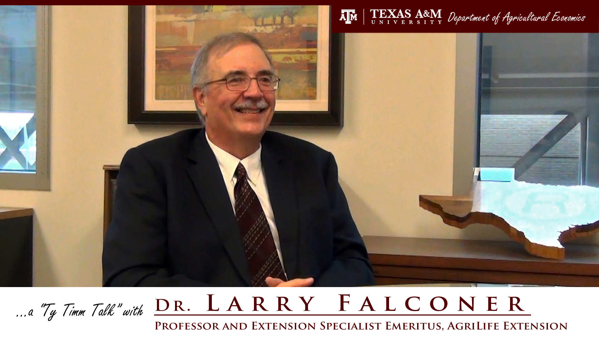 The words "a ty timm talk with Dr. Larry Falconer - professor and extension specialist emeritus, AgriLife Extension" run along the bottom. Dr. Falconer, wearing a black suit, sits with clasped hands and smiles facing slightly right.