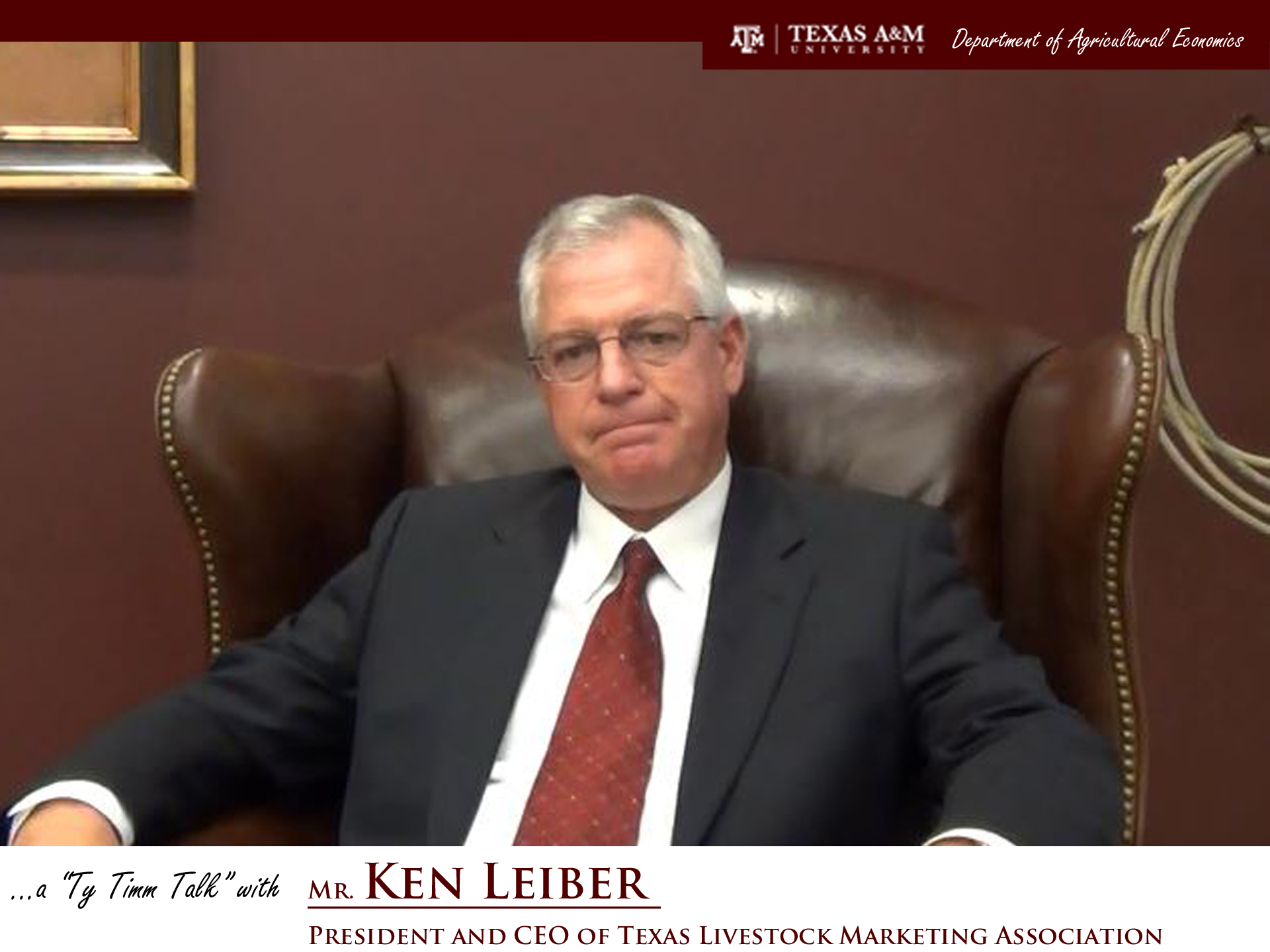 The words "a ty timm talk with Mr. Ken Leiber - President and CEO of Texas Livestock Marketing Association" run along the bottom. Mr. Leiber is seated and wearing a black suit and red tie.