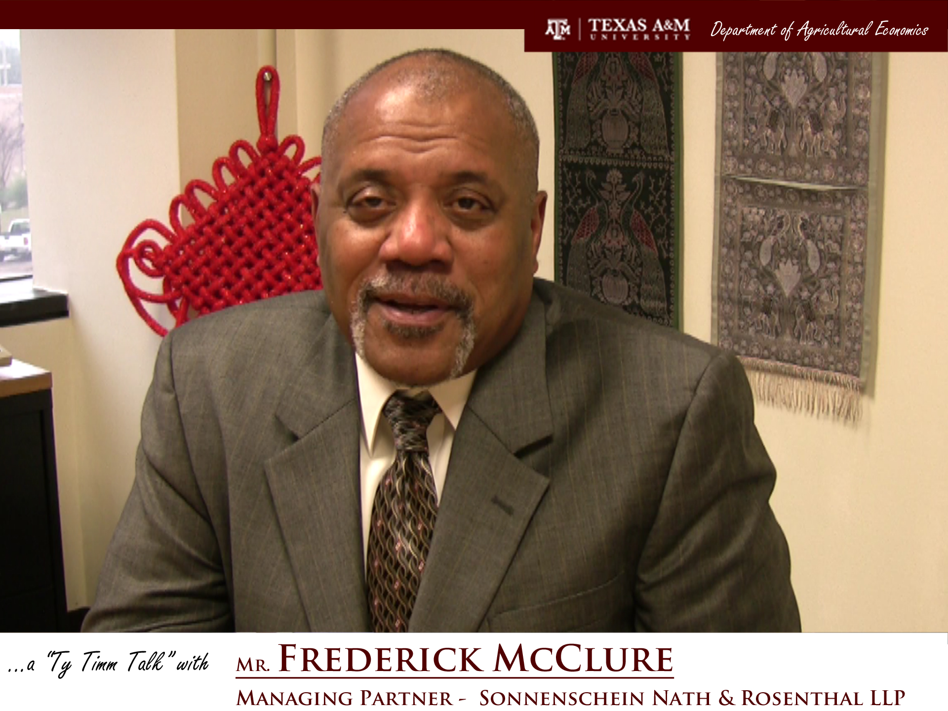 The words "a ty timm talk with Mr. Frederick McClure - Managing Partner - Sonnenshein Nath & Rosenthal LLP" run along the bottom. Mr. McClure is seated and wearing a grey suit, smiling in front of decorative East Asian cloths.