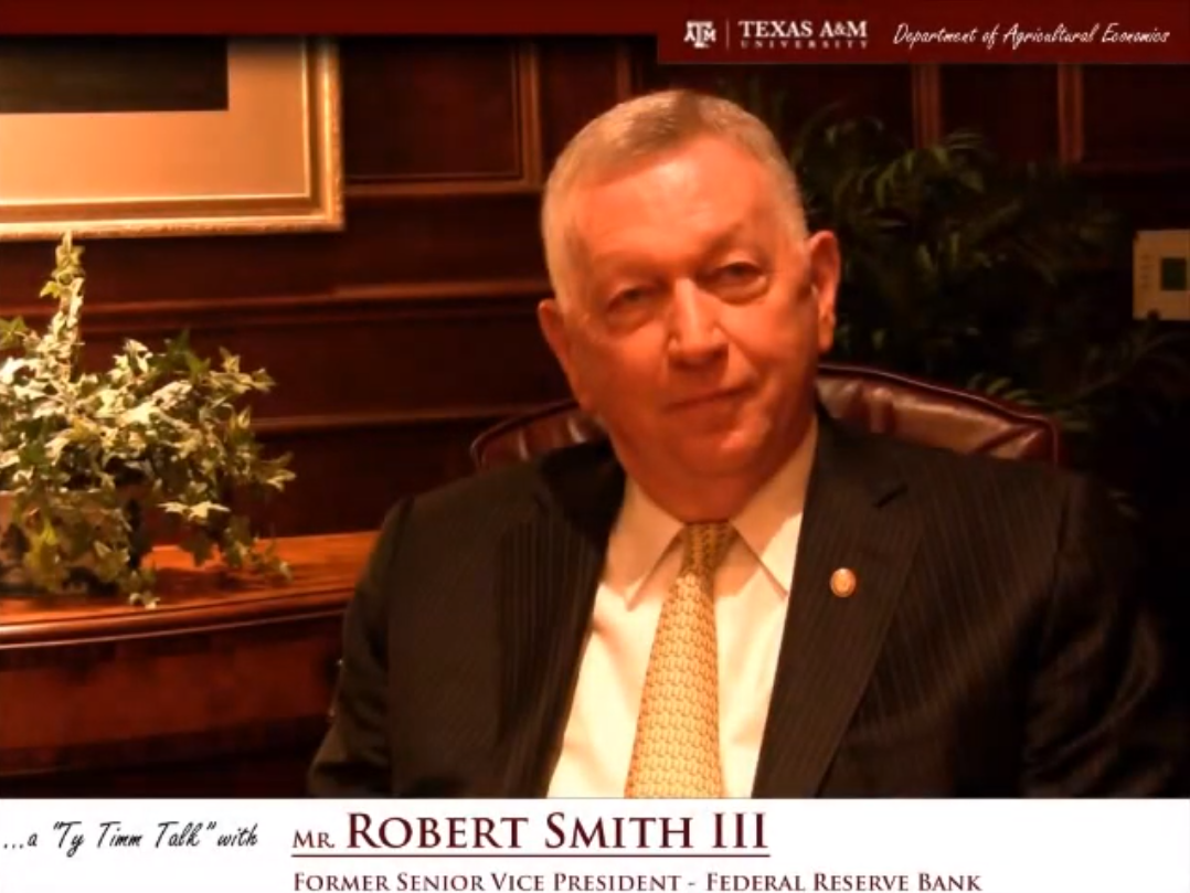 Thumbnail. The words "a ty timm talk with Mr. Robert Smith III - Former Senior Vice President - Federal Reserve Bank" run along the bottom. Mr. Smith is seated and wearing a black suit, smiling. Click for Interview.