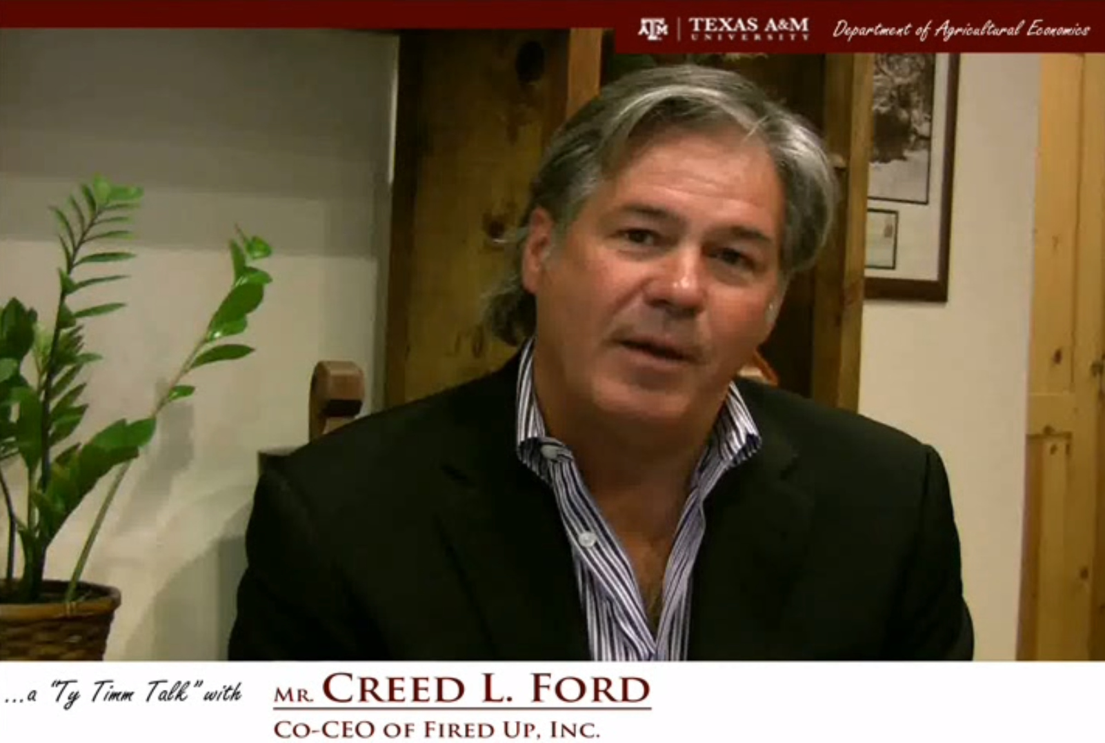 The words "a ty timm talk with Mr. Creed L. Ford - Co-CEO of Fired Up. Inc" run along the bottom. Mr. Ford, in a black suit, sits facing straight ahead.