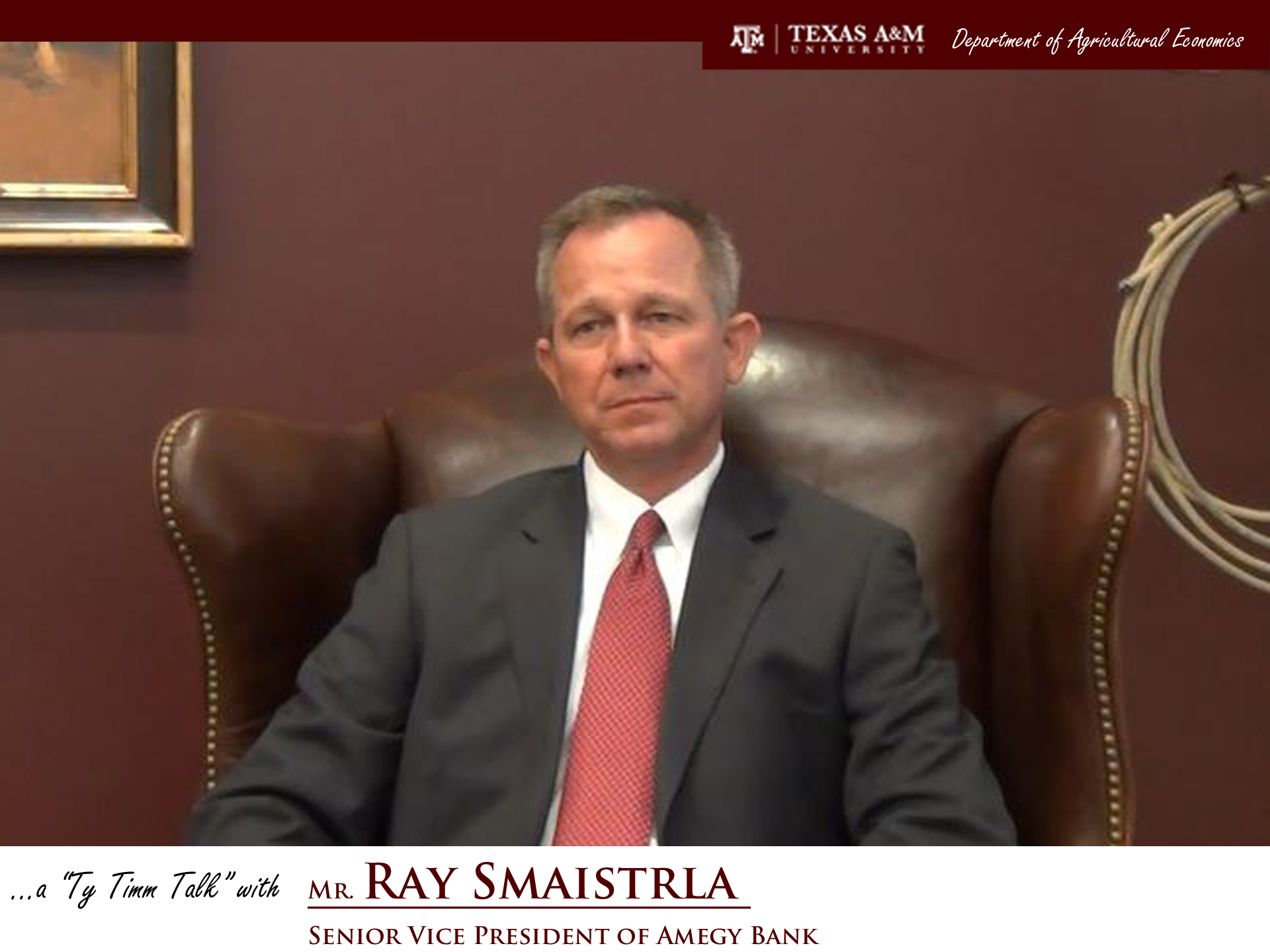 Thumbnail. The words "a ty timm talk with Mr. Ray Smaistrla - Senior Vice Presdient of Amegy Bank" run along the bottom. Mr. Smaistrla is seated and wearing a black suit, smiling. Click for interview