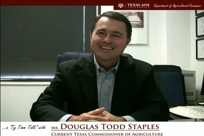 Thumbnail. The words "a ty timm talk with Mr. Douglas Todd Staples - Current Texas Commissioner of Agriculture" run along the bottom. Mr. Staples is seated and wearing a grey suit, smiling. Click for interview