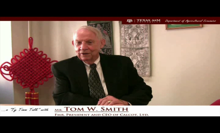 Thumbnail.The words "a ty timm talk with Mr. Tom W. Smith - Fmr. President and CEO of Calcot Ltd. " run along the bottom. Mr. Smith is seated and wearing a black suit, smiling.