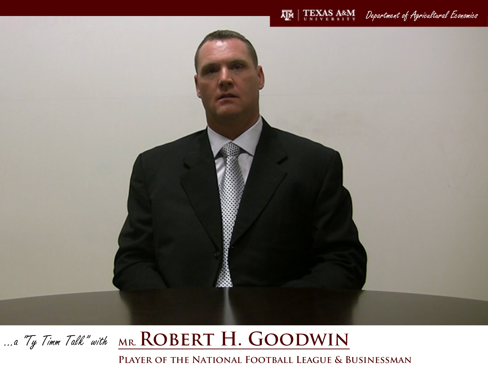 The words "a ty timm talk with Mr. Robert H. Goodwin - Player of the National Football League and Businessman" run along the bottom. Mr. Goodwin is seated and wearing a black suit against a white background.