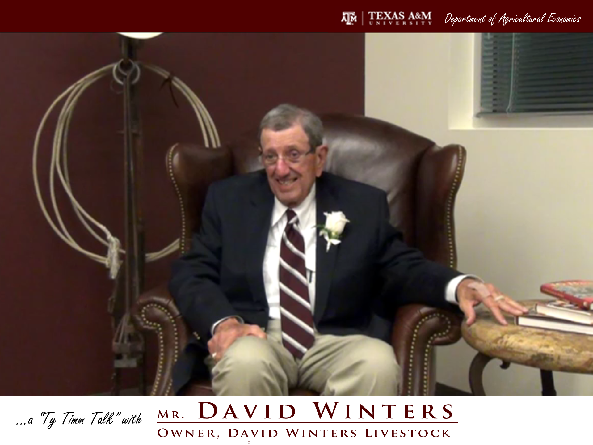 The words "a ty timm talk with Mr. David Winters - owner, David Winters Livestock" run along the bottom. Mr. Winters wears a dark suit and khaki pants and is smiling,seated in a brown leather chair with a hand outstretched