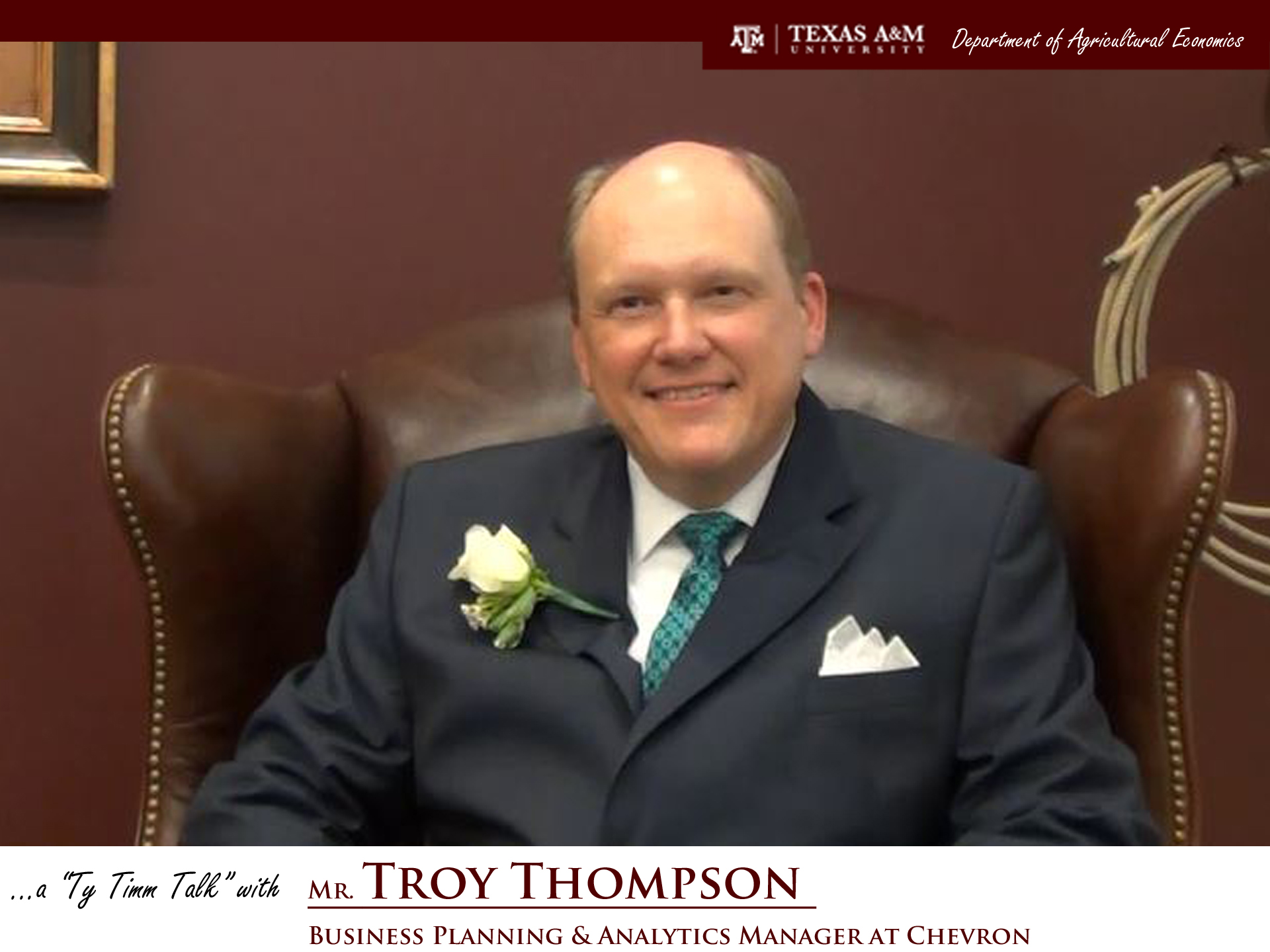 Thumbnail. The words "a ty timm talk with Mr. Troy Thompson - Business Planning & Analytics Manager at Chevron" run along the bottom. Mr. Thompson is seated and wearing a black suit, smiling.