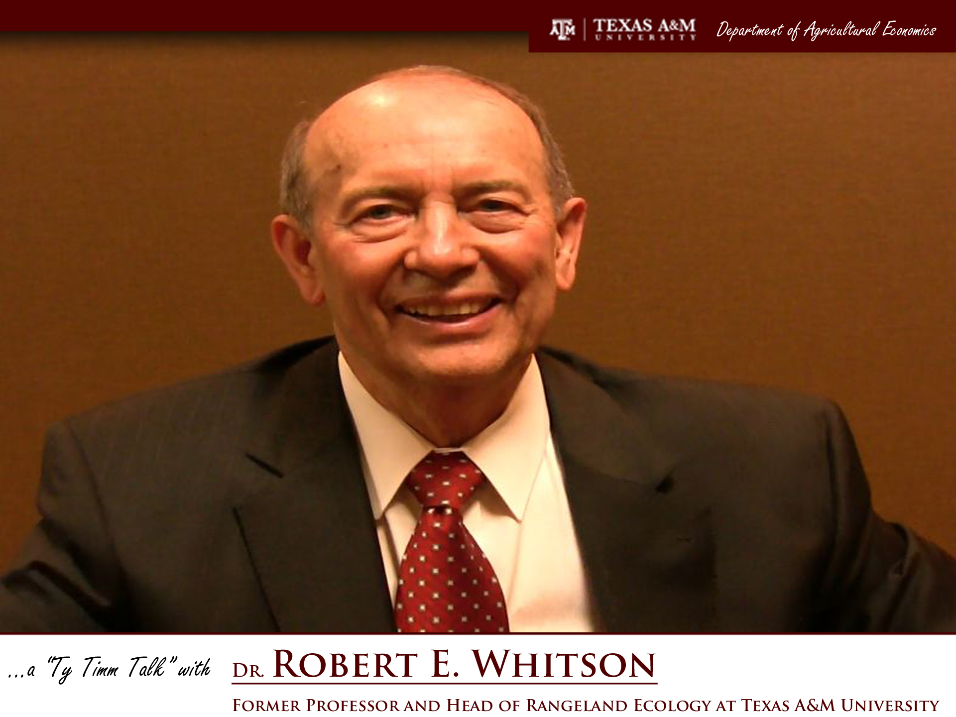 Thumbnail. The words "a ty timm talk with Dr. Robert E. Whitson" run along the bottom. Dr. Whitson is seated and wearing a grey suit, smiling. Click for interview